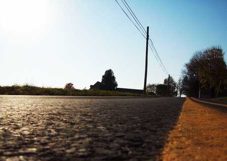 Country Road - silo, fields, green, yellow lines, farmland, road, asphalt, grass