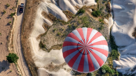 parachute landing near a country road