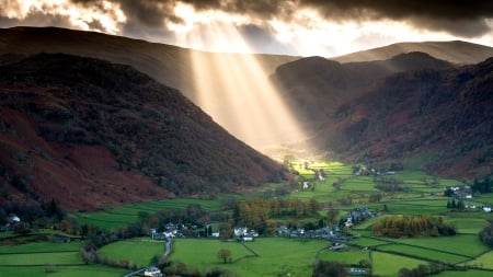 Sunrays - valley, dark, landscape, clouds, mountains