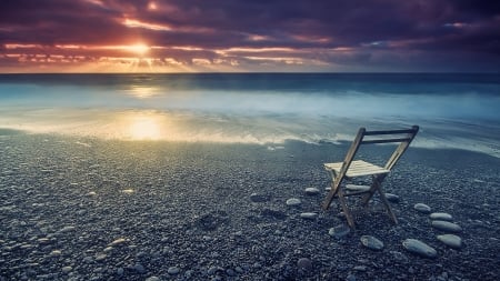 folding chair on a beach at sunset - beach, sunset, chairs, stones, sea