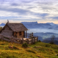 little wood cabin on a mountaintop in austria hdr