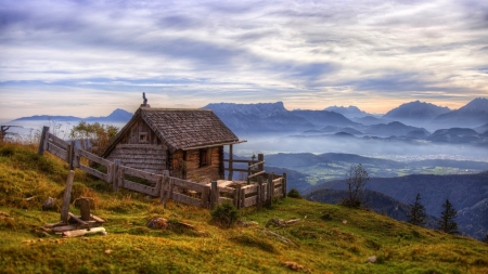 little wood cabin on a mountaintop in austria hdr