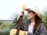 Cowgirl and Her Guitar