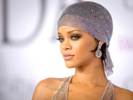 RIHANNA - producer, singer, model, songwriter