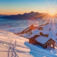 mountain church above the clouds in winter