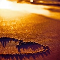 Love heart in the sand