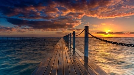 wooden sea ramp at sunset hdr