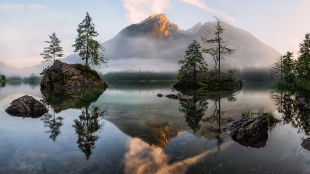 lake reflections in morning mist