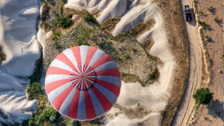 above a hot air balloon over sand dunes - aerial, dunes, balloon, flight, sand