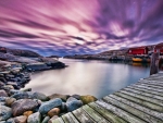 purple sky over a fishing harbor hdr