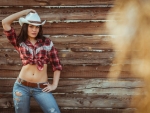 Cowgirl Model Posing On Farm