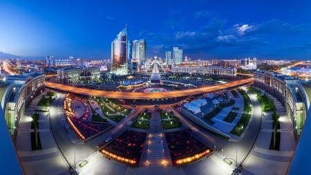 panorama of astana kazakhstan - downtown, highway, skyscrapers, dusk, city