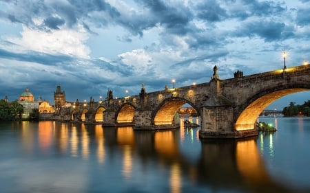 Charles Bridge, Prague - reflections, clouds, river, arcades, lights, evening, vltava, sky