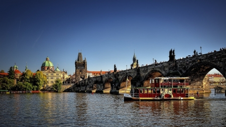 tour boat gliding under a bridge in prague - river, city, boat, bridge