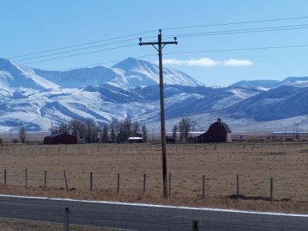 Snowstorm south of Butte, Montana - mountains, sky, scenic, farms