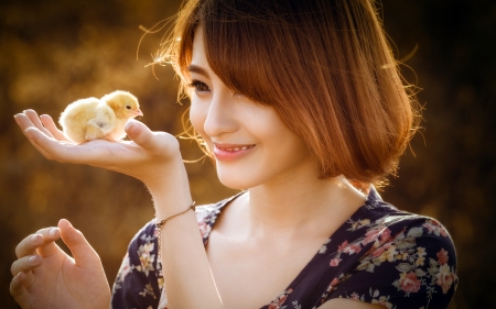 Girl with chick - smile, hand, woman, model, girl, cute, chick, asian