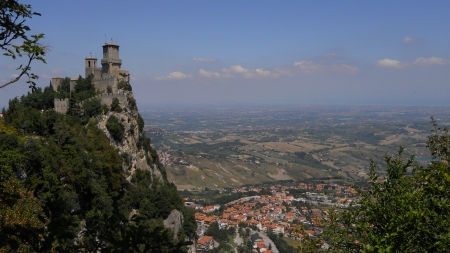 San Marino castle - stone, ancient, sky, mountain, cliff, monument, forest, cloud, castle, city, rock, medieval, sea