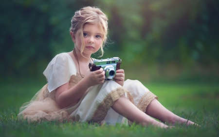 Little photographer - photographer, girl, camera, green, child, summer, copil, grass