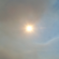 Sun peaking through Smoky Skies