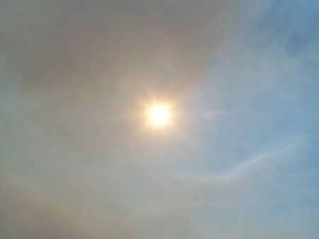 Sun peaking through Smoky Skies - fires, sky, mountains, sun