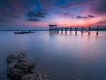 ocean sunset over a pier