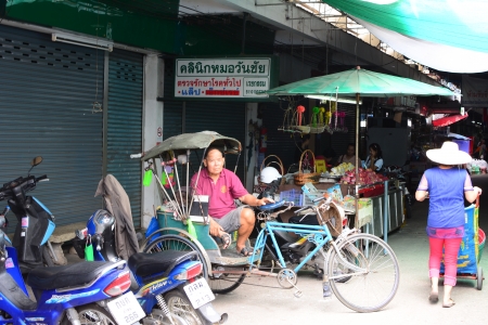 Samlor driver resting - sunday, market, resting, samlor  thailand, scene