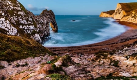 Bay with Arch - sky, cliff, water, stones, sea