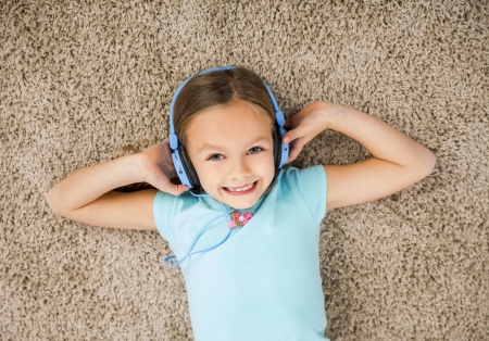 It's Sunday! Relax! - smile, headphones, carpet, blue, girl, copil, child