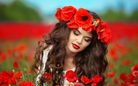 Girl in a wreath of poppies