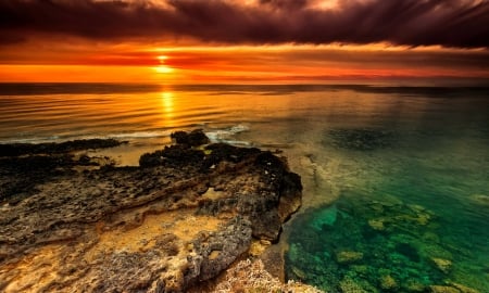 Sea sunset - clouds, water, summer, amazing, sea, reflection, stones, shore, sunset, waves, fiery, golden, sky