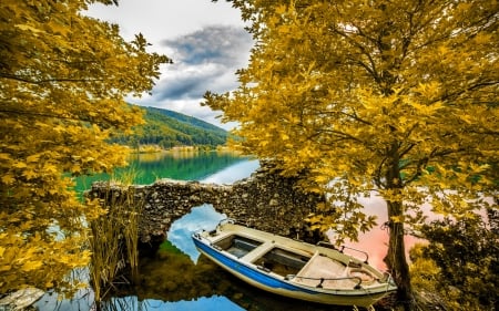 Abandoned boat in autumn