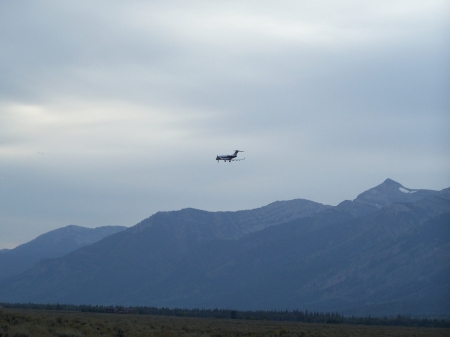 Landing, Jackson Hole, Wyoming Airport - airports, airplanes, airstrips, scenic, mountains, commercial, private