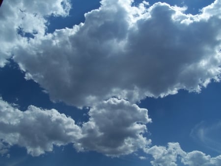 Clouds forming in Blue Sky, Victor, Idaho