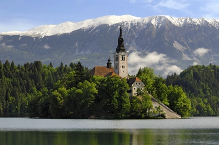 Church Island in Lake Bled, Slovenia - trees, water, mountains, chappel