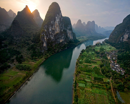 Sunrise over a Chinese landscape - river, landscape, sunrise, mountains, farms