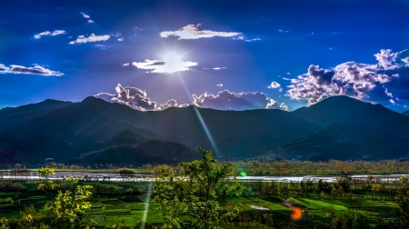 sunlight passing through gray clouds - nature, sky, landscape, sunlight, clouds, mountains