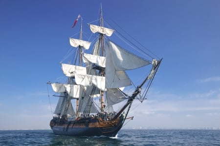 With raised sails