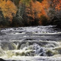 Autumn by the waterfall in New Hampshire