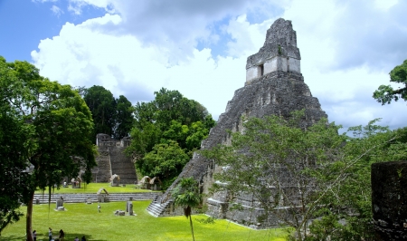 Tikal - sky, lost world, guatemala, giant, ceremonial lost world pyramid, ruins, maya, clouds, architecture, abandoned, tikal, temple of the grand jaguar, ancient, archaeological site, pyramid, temple iv, citadel, mexican, jungle, steps, city