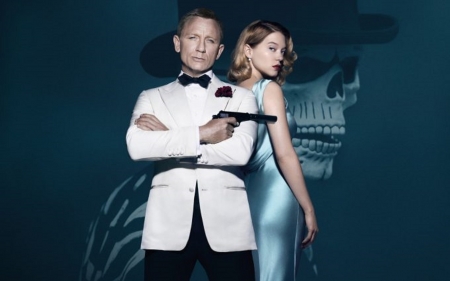 Lea Seydoux & Daniel Craig - skull, graig in white tux jacket, holding pistol, hat, seydoux in long pale blue silk gown, posing together