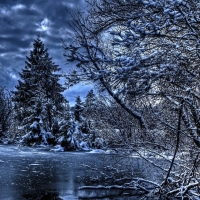 Dark Clouds over Frozen Winter River