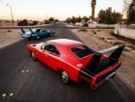 Dodge In  Red & Plymouth Of Blue