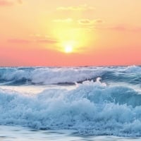 Ocean Waves in Sunset Horizon