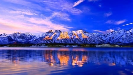 Light on the Mountains - lakeshore, slope, lake, mountain, cliff, water, nature, reflection, snow, river