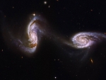 Arp 240 A Bridge between Spiral Galaxies from Hubble