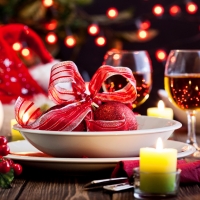 Christmas tableware on wooden table