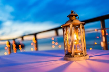 Lantern on table at twilight sky - sky, lantern, pretty, winter, beautiful, table, twilight, snow