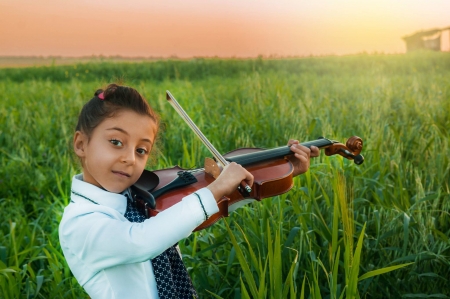 little girl - guitar, people, hair, sunset, belle, sightly, white, face, childhood, fair, grass, little, bonny, adorable, wallpaper, child, beautiful, pink, sweet, nice, beauty, sky, photography, standing, pretty, baby, green, cute, kid, fields, girl, dainty, lovely, pure, comely, play, desktopnexus, blonde