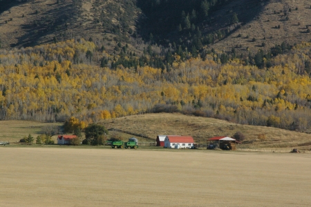 Farm SH-31 Swan Valley, Idaho - fields, autumn, scenic, mountains, farm implements, fall, harvest, machinery, barns