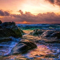 rocky waves at sundown